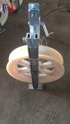 프로 OPGW 케이블 스트링 블록 안전 660x110mm 잎 크기와 20-50KN 등급 부하 광섬유 지상 유선 설치를 위해 비 금속 라인러